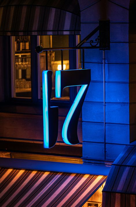 storfront illuminated sign of number 17